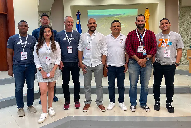 organizers behind a booth at an event
